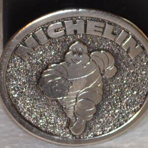 MICHELIN MAN TIRE MAN LOGO BELT BUCKLE MICHELIN TIRE COMPANY VTG 1980'S